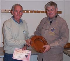 The monthly winner David Ward receiving his certificate from Stuart Mortimer